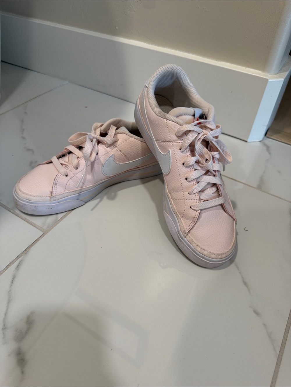 Nike Pink Low-Top Sneakers with White Swoosh